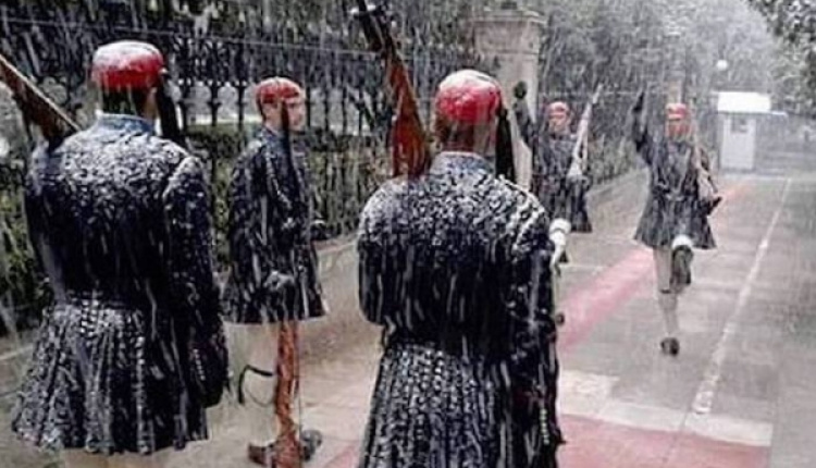 Changing Of The Guard Goes On Despite Weather Conditions
